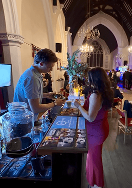 Sustainable wine being poured at the charity event bar